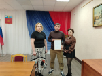 Вручение Свидетельства о предоставлении субсидии на оплату первоначального взноса при получении ипотечного жилищного кредита.